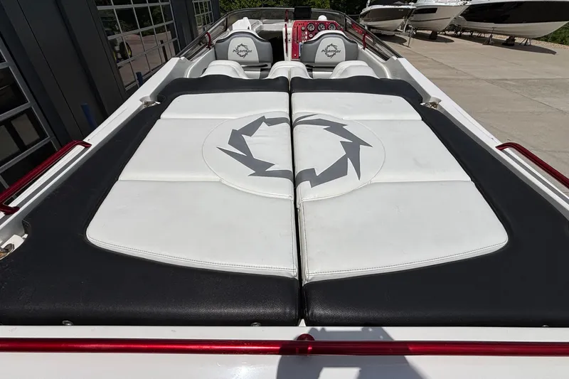Slide: The Image of 2007 Fountain 42 Lightning boat interior with white and black seating, logo visible. - 5