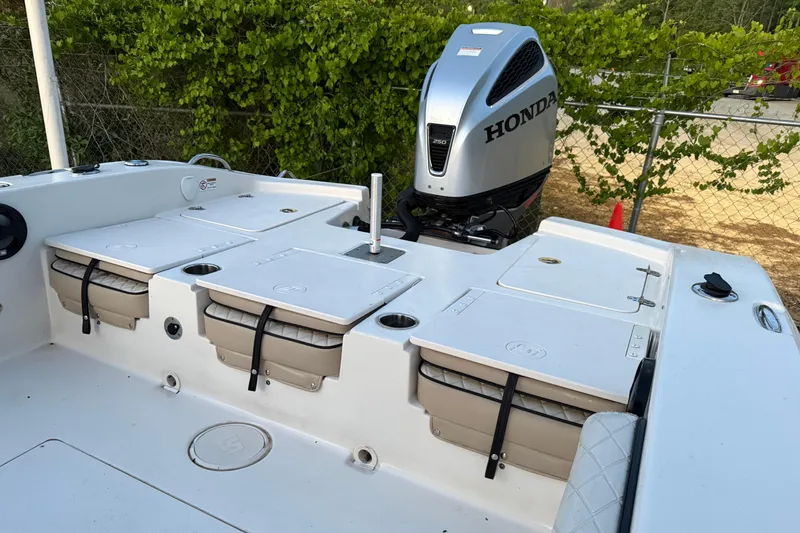 Slide: The Image of 2021 Carolina Skiff 26 Ultra Elite boat with Honda 250 VTEC engine on trailer. - 10