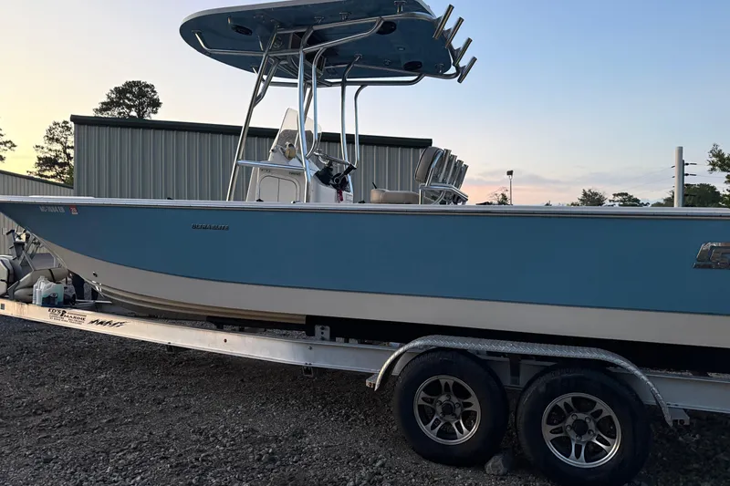 Slide: The Image of Honda speedometer displaying 75.6 engine hours on a 2021 Carolina Skiff 26 Ultra Elite. - 17