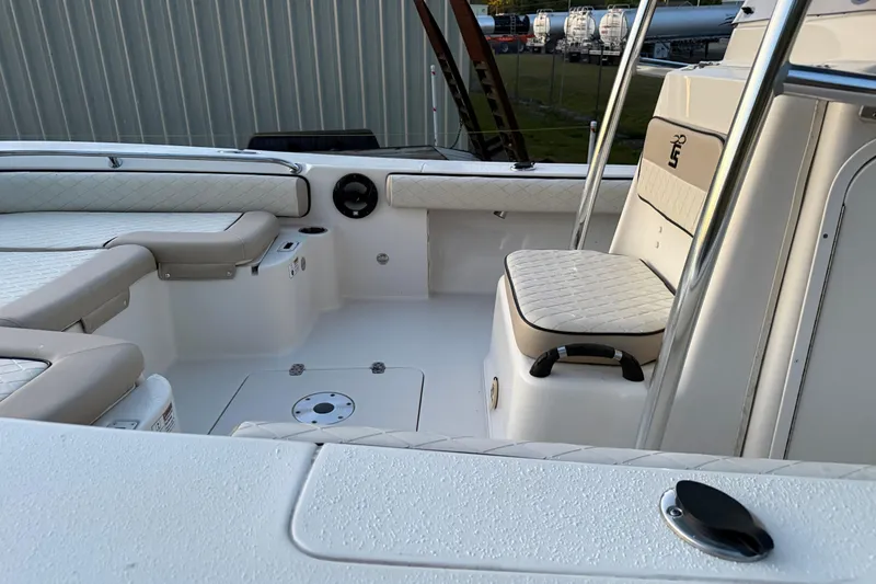 Slide: The Image of 2021 Carolina Skiff 26 Ultra Elite boat with Honda outboard motor on trailer. - 8