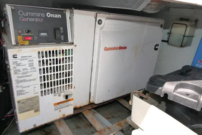 Slide: The Image of Cummins Onan generator in a 2014 Tayana Isara 50 yacht engine room. - 101