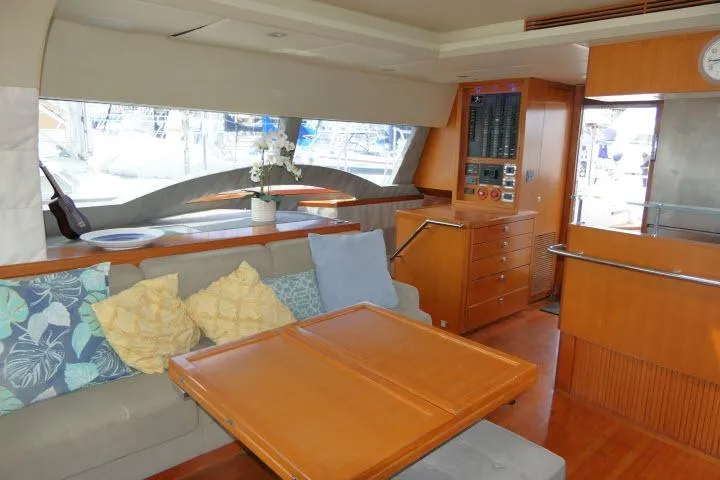 Slide: The Image of Luxurious interior of 2014 Tayana Isara 50 yacht with elegant seating and wooden finishes. - 11