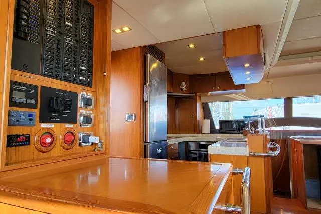 Slide: The Image of Luxurious interior of 2014 Tayana Isara 50 yacht with modern kitchen and control panel. - 19