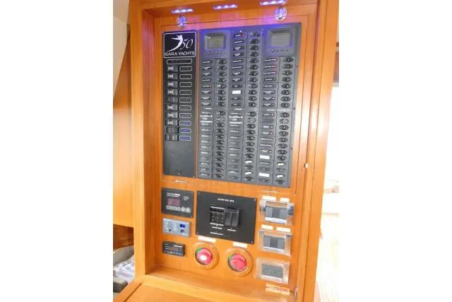 Slide: The Image of Electrical panel of 2014 Tayana Isara 50 yacht with switches and controls. - 20
