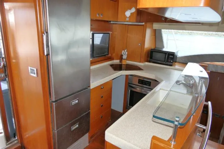 Slide: The Image of Modern kitchen interior of 2014 Tayana Isara 50 yacht with stainless steel appliances. - 22