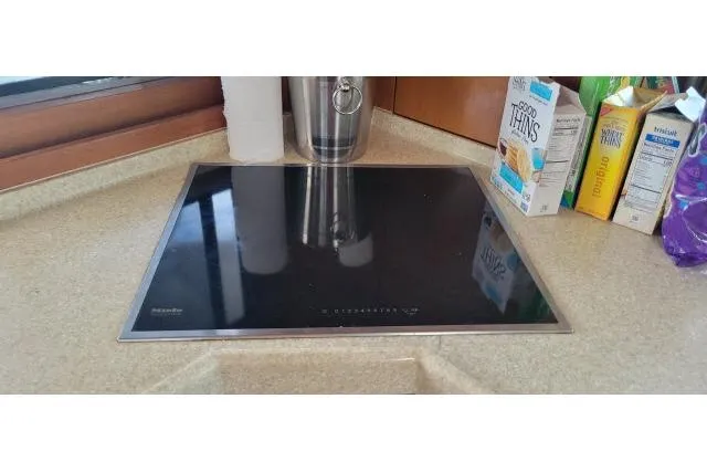 Slide: The Image of Modern kitchen countertop with induction cooktop on Tayana Isara 50 yacht, 2014 model. - 24