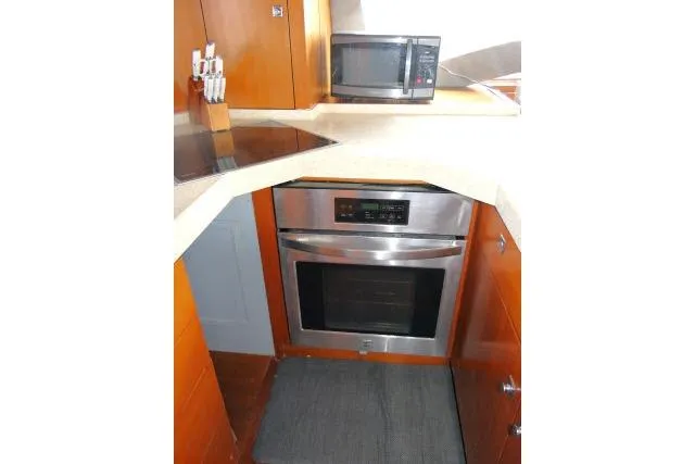 Slide: The Image of Kitchen area of 2014 Tayana Isara 50 yacht with oven and microwave. - 25
