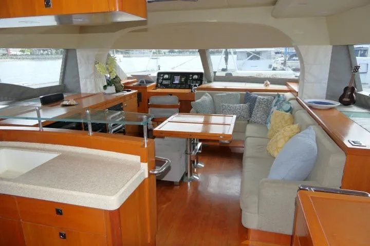 Slide: The Image of Luxurious interior of 2014 Tayana Isara 50 yacht with modern furnishings and panoramic windows. - 3