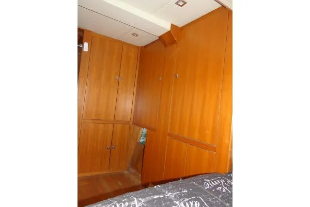 Slide: The Image of Interior cabin of 2014 Tayana Isara 50 yacht with wooden cabinetry. - 32