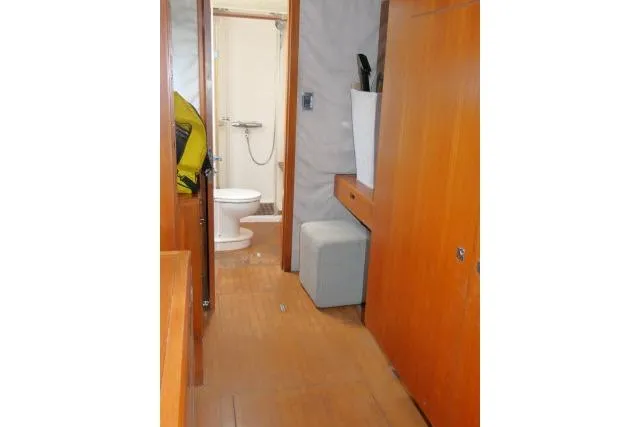 Slide: The Image of Interior of 2014 Tayana Isara 50 yacht featuring wooden cabinetry and bathroom. - 36