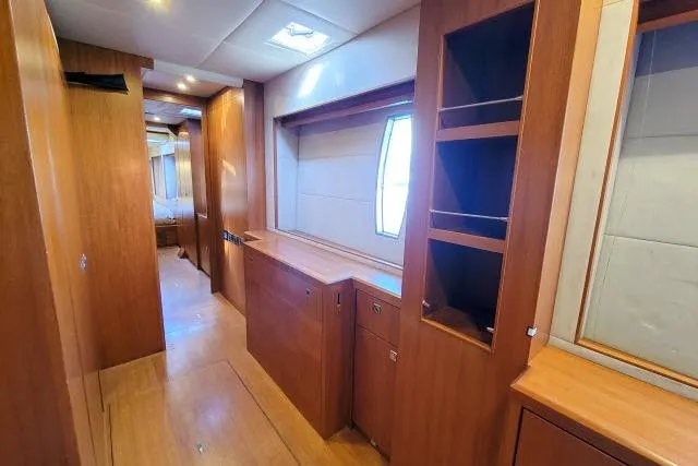 Slide: The Image of Interior of 2014 Tayana Isara 50 yacht with wooden cabinetry and window. - 42