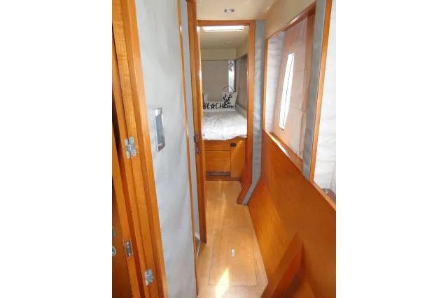 Slide: The Image of Interior hallway of 2014 Tayana Isara 50 yacht with wooden finishes and cozy cabin. - 49