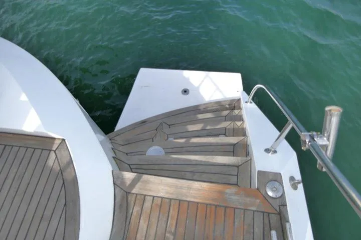 Slide: The Image of Staircase on 2014 Tayana Isara 50 yacht leading to water. - 61