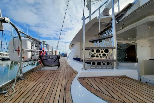 Slide: The Image of Deck view of 2014 Tayana Isara 50 yacht with wooden flooring and modern design. - 72