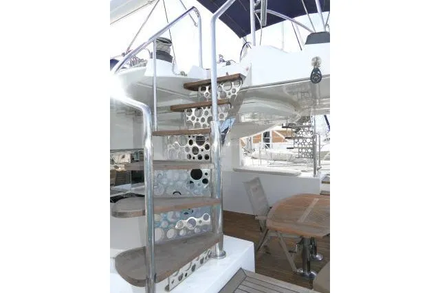 Slide: The Image of Staircase on 2014 Tayana Isara 50 yacht with modern design and outdoor seating area. - 73
