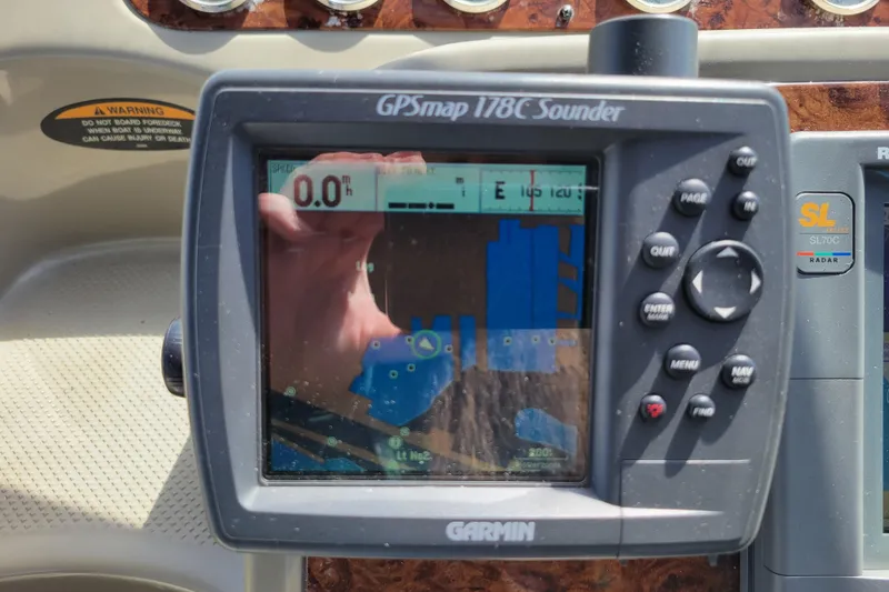Slide: The Image of Garmin GPSmap 178C Sounder on 1999 Bayliner 3055 Ciera Sunbridge dashboard. - 16