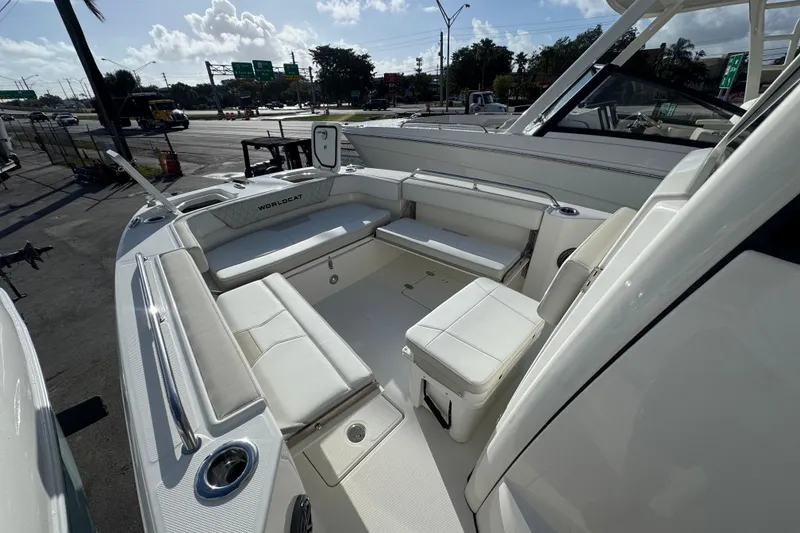 Slide: The Image of 2026 World Cat 235 TE boat interior with spacious seating and modern design. - 10