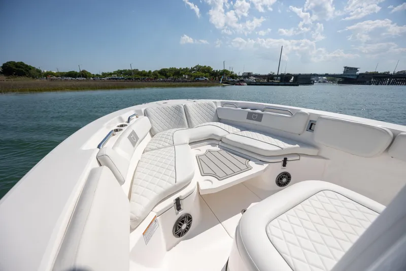 Slide: The Image of Luxurious seating on 2025 Sea Fox 228 Commander boat, featuring elegant white upholstery. - 10