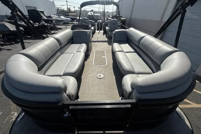 Slide: The Image of 2018 Regency 254 LE3 pontoon boat with spacious seating and sleek design. - 14