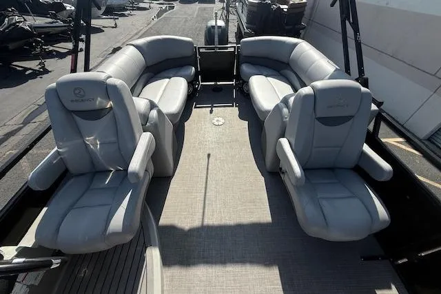 Slide: The Image of 2018 Regency 254 LE3 boat interior with luxurious gray seating and spacious layout. - 17