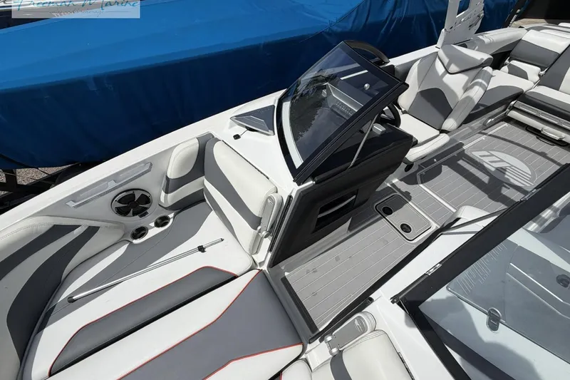 Slide: The Image of 2019 Malibu Wakesetter 24 MXZ interior with sleek seating and modern design. - 14
