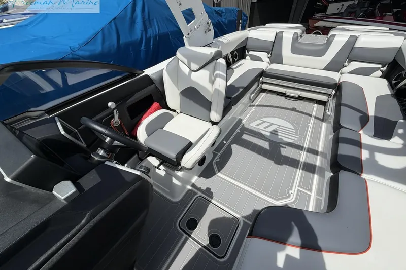 Slide: The Image of 2019 Malibu Wakesetter 24 MXZ interior with sleek seating and modern design. - 17