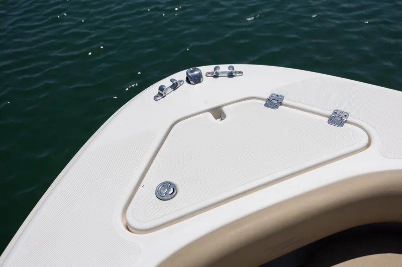 Slide: The Image of Bow of 2019 Pioneer 180 Islander boat with storage compartment and cleats. - 10