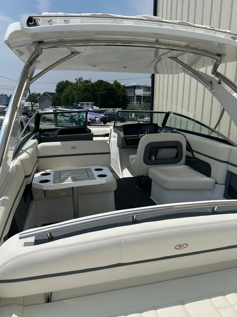 Slide: The Image of Interior view of a 2021 Cobalt 30SC boat with seating area. - 4