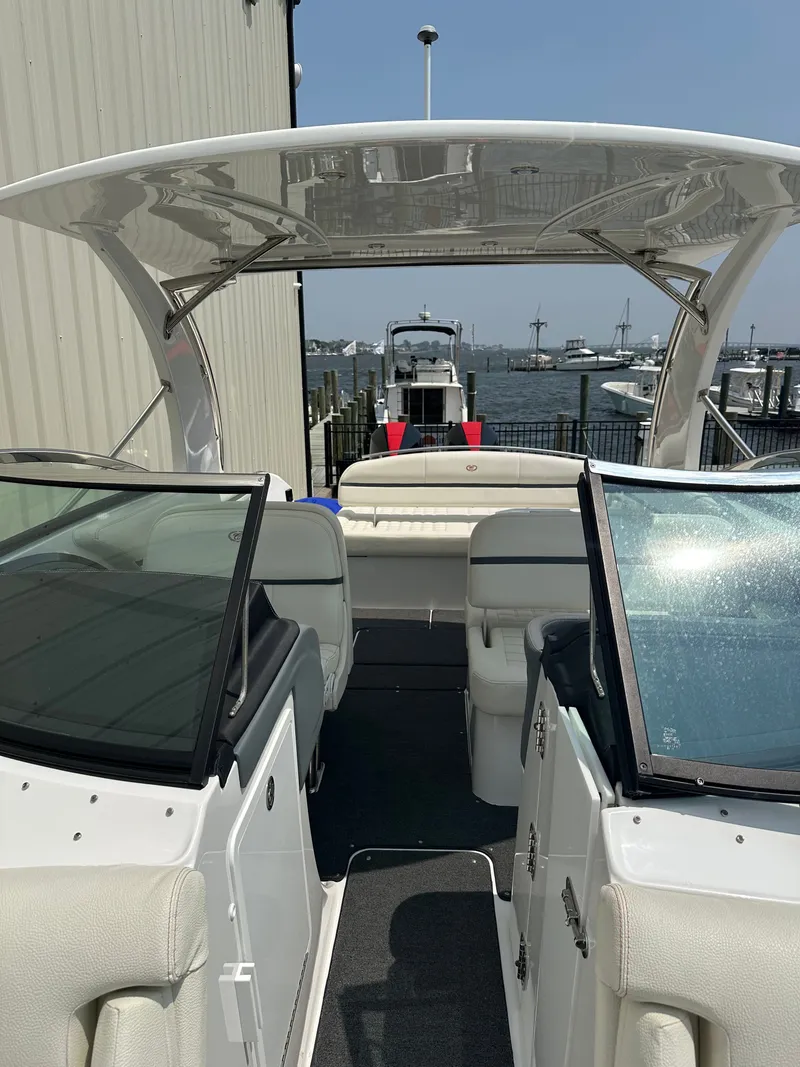 Slide: The Image of Interior of a 2021 Cobalt 30SC boat at the dock. - 7