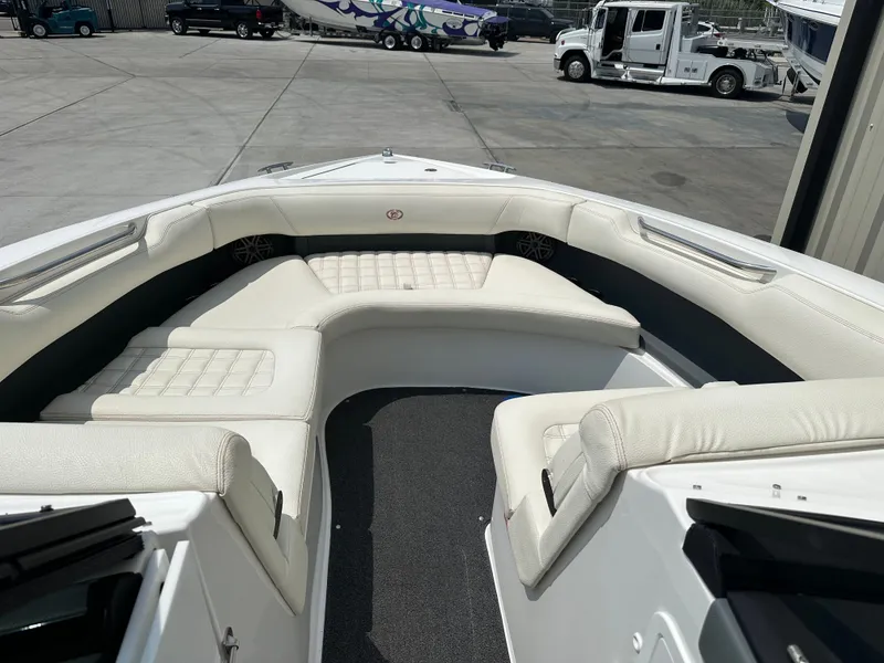 Slide: The Image of Interior of a 2021 Cobalt 30SC boat with white seating. - 8