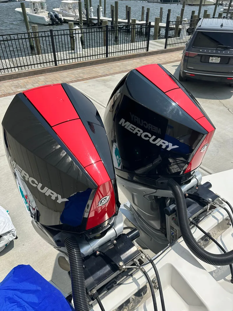 Slide: The Image of Two Mercury outboard engines on a 2021 Cobalt 30SC boat. - 9
