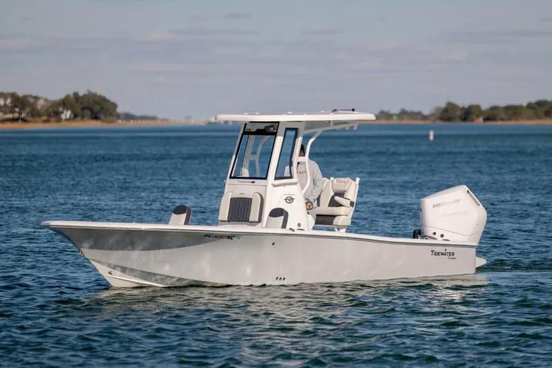 The Image of 2024 Tidewater 2500 Carolina Bay boat cruising on calm waters. - 1