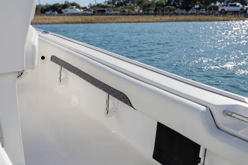 Slide: The Image of 2024 Tidewater 2500 Carolina Bay boat interior with water view. - 19