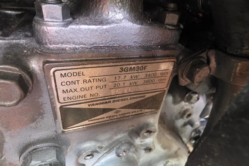 Slide: The Image of Yanmar diesel engine model 3GM30F label on a 1995 Hunter 336 sailboat. - 19