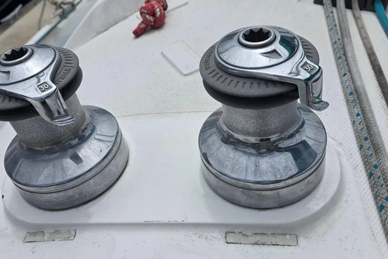 Slide: The Image of Winches on a 1995 Hunter 336 sailboat deck with ropes and fittings. - 21
