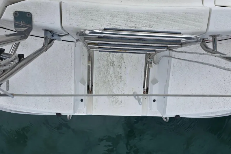Slide: The Image of Sailboat swim platform with ladder, Hunter 336, 1995 model, above water view. - 27