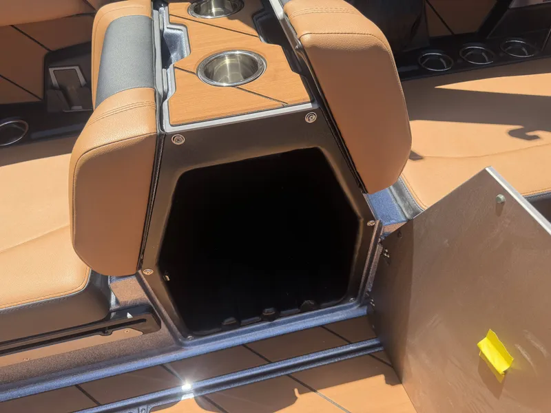 Slide: The Image of Interior of 2026 Malibu 26LSV with storage and cup holders. - 11