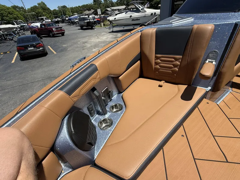 Slide: The Image of Luxurious interior of 2026 Malibu 26LSV with brown leather seating. - 15