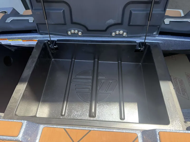 Slide: The Image of Storage compartment in 2026 Malibu 26LSV boat. - 17