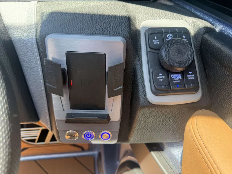 Slide: The Image of 2026 Malibu 26LSV control console with controls and charger. - 20