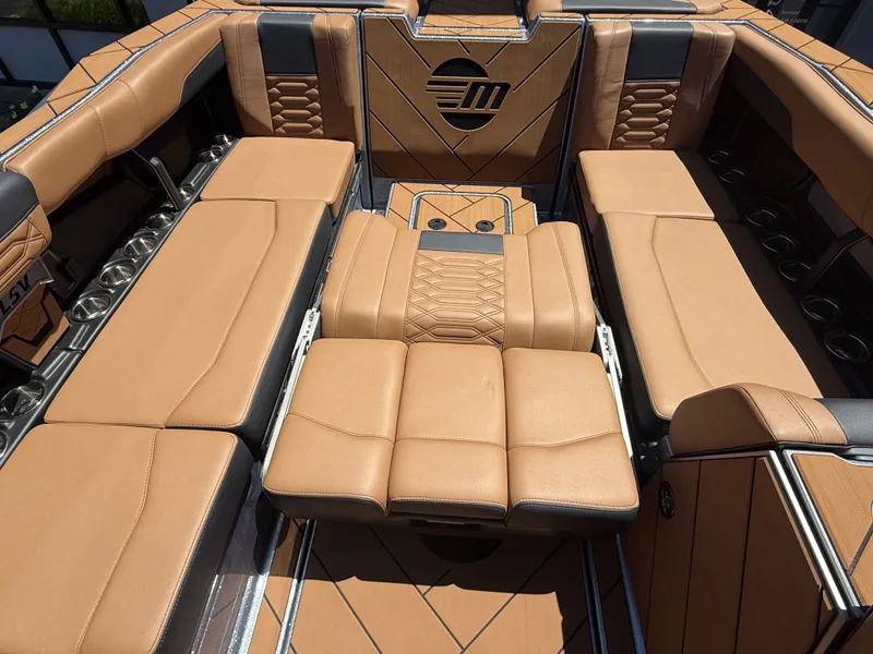 Slide: The Image of Luxurious interior of 2026 Malibu 26LSV with brown leather seating. - 27