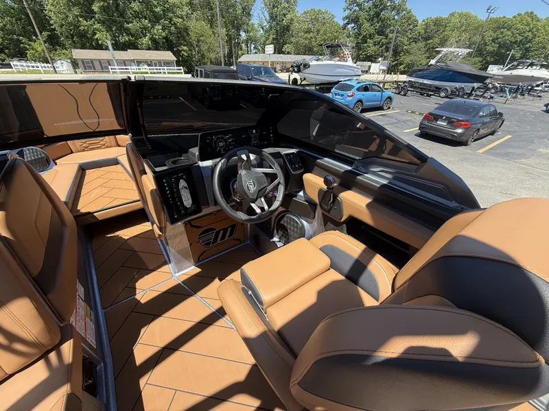 Slide: The Image of Interior of a 2026 Malibu 26LSV boat with luxurious features. - 29