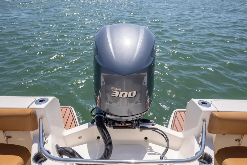 Slide: The Image of 2019 Pioneer 222 Sportfish boat with Yamaha 300 engine on water. - 19