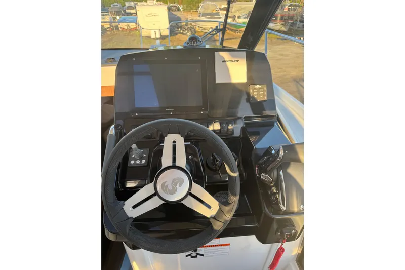 Slide: The Image of Helm of 2026 Beneteau Antares 9 V2 with modern controls and navigation display. - 4