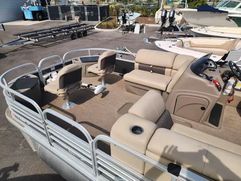 Slide: The Image of Interior view of a 2022 Sun Tracker 22 DLX pontoon boat. - 15