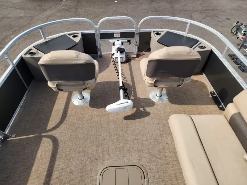 Slide: The Image of Interior view of a 2022 Sun Tracker 22 DLX pontoon boat. - 16