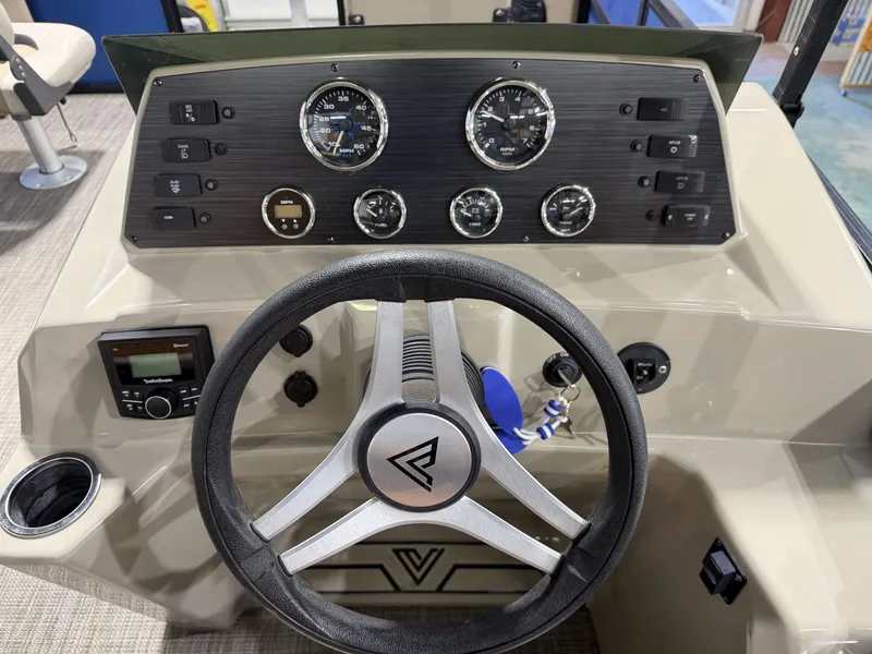 Slide: The Image of Viaggio Lago L20F 2023 helm with gauges and steering wheel. - 5