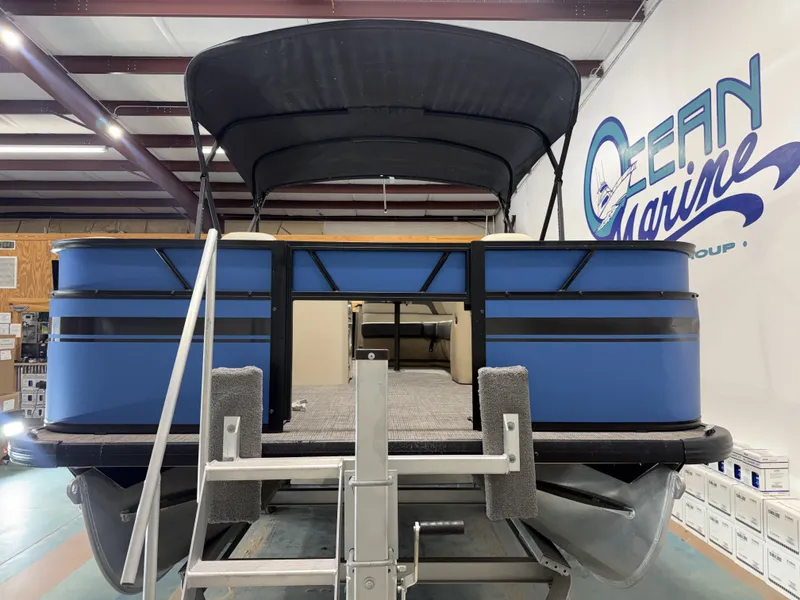 Slide: The Image of Viaggio Lago L20F 2023 pontoon boat in a warehouse setting. - 8
