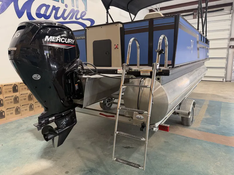 Slide: The Image of Viaggio Lago L20F 2023 pontoon boat with Mercury engine in a workshop. - 9