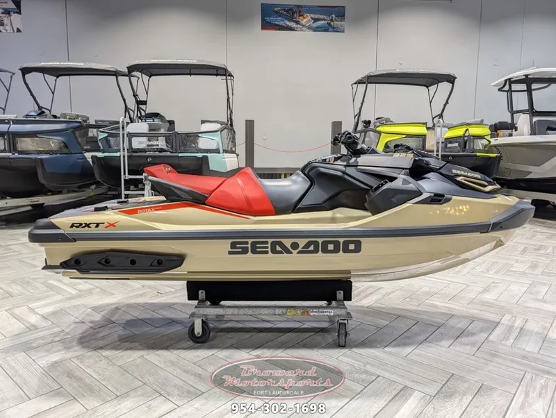 The Image of 2025 Sea-Doo RXT-X 325 jet ski in a showroom. - 0